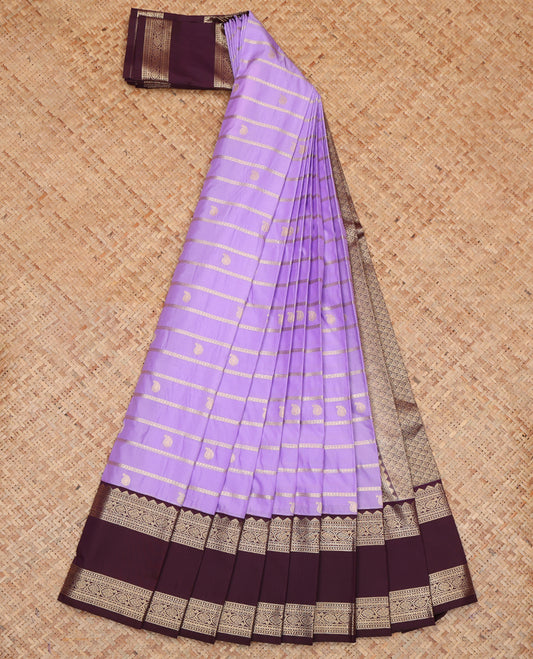 Lavender Budget Silk Saree, Detailed with Zari Buttas and Stripes, a Contrast Traditional Zari Rettai Pettu Border, Grand Pallu, and a Contrast Blouse