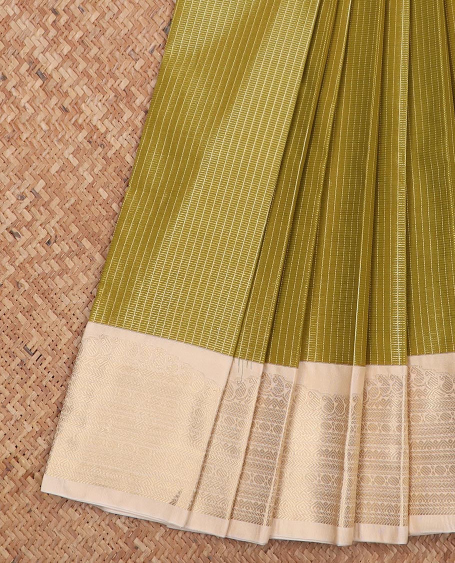 Green micro-checked design gift saree, contrast traditional zari design border, and intricate pallu