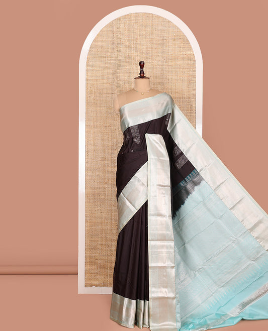 Dark Brown Budget Silk Saree, Majestically Detailed with Zari Buttas All Over Its Body, Complemented by a Contrast Border of Traditional Zari Designs, Beautifully Bedecked Pallu, and Paired with a Contrast Blouse