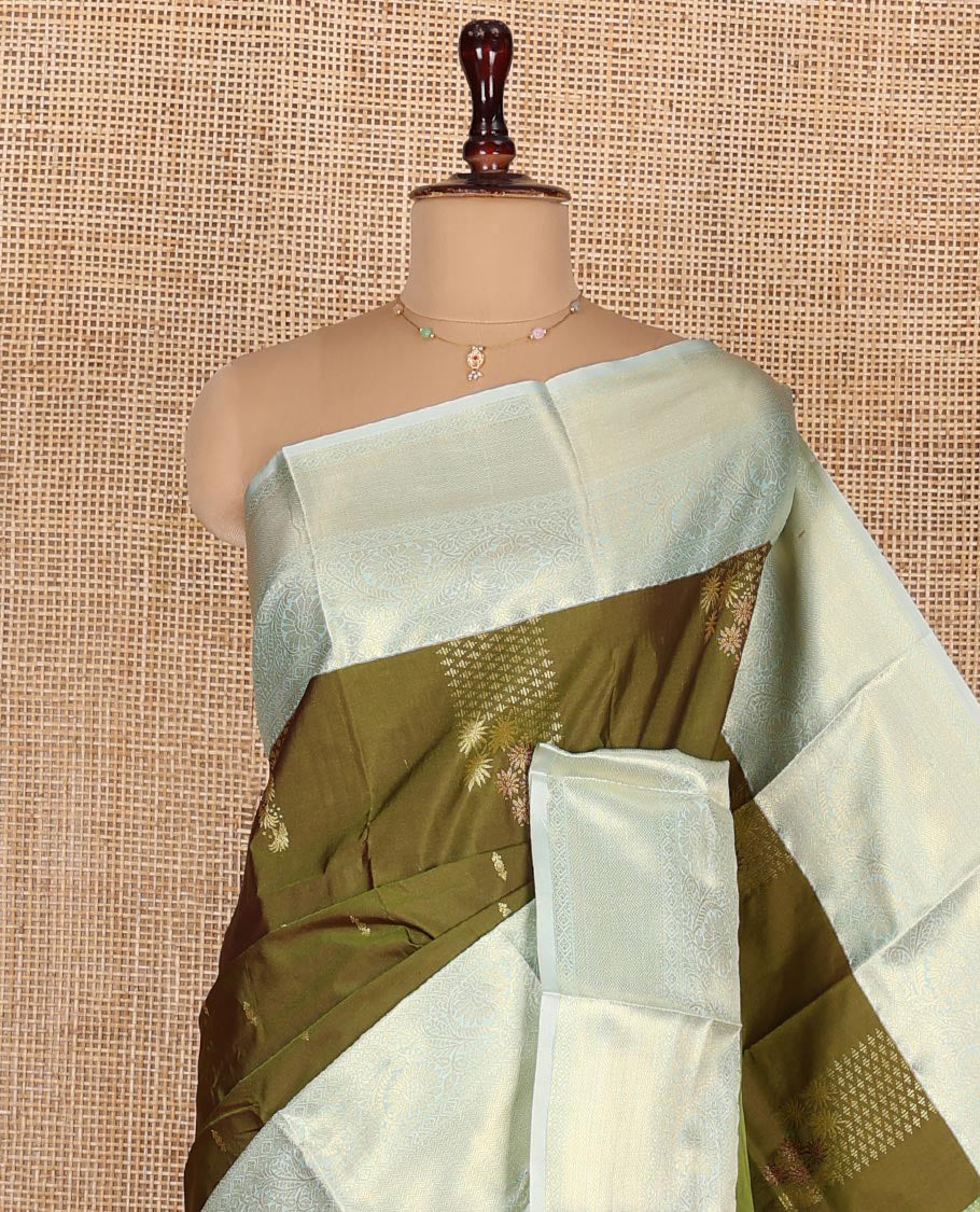 Green Budget Silk Saree, Adorned with Zari Buttas on Its Body, Complemented by a Contrast Traditional Zari Border of Floral Creeper Designs, Pallu of Jaal Designs, and Paired with a Contrast Blouse