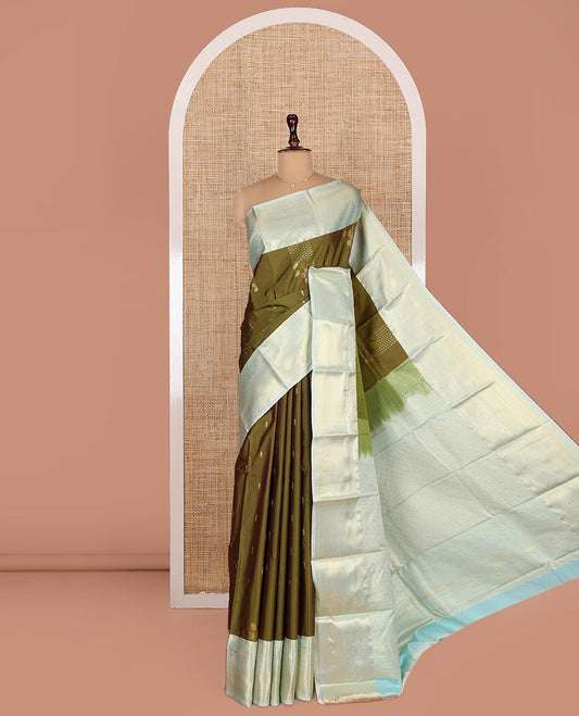 Green Budget Silk Saree, Adorned with Zari Buttas on Its Body, Complemented by a Contrast Traditional Zari Border of Floral Creeper Designs, Pallu of Jaal Designs, and Paired with a Contrast Blouse