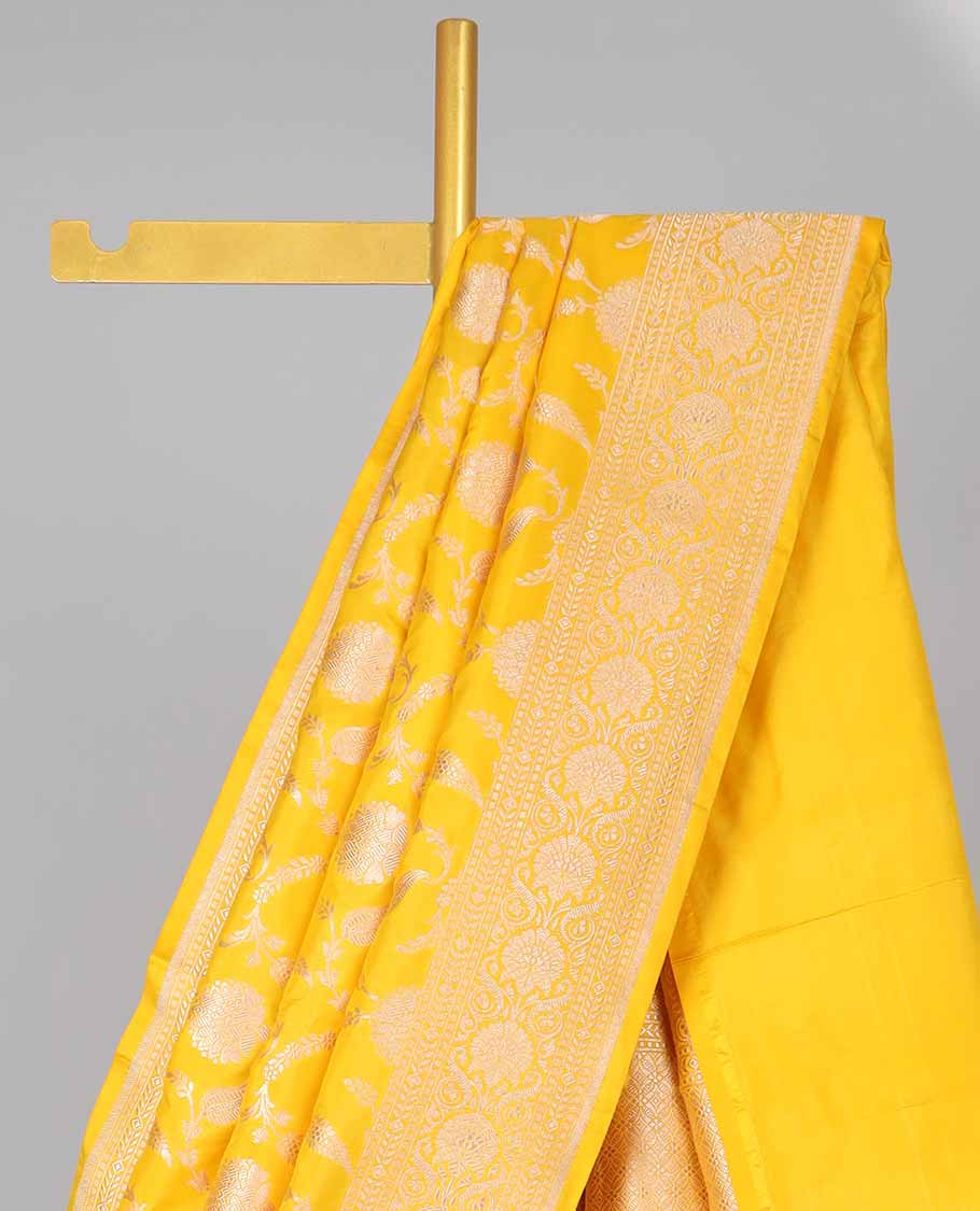 Yellow floral jacquard banaras silk saree with self intricate zari border & floral zari design pallu