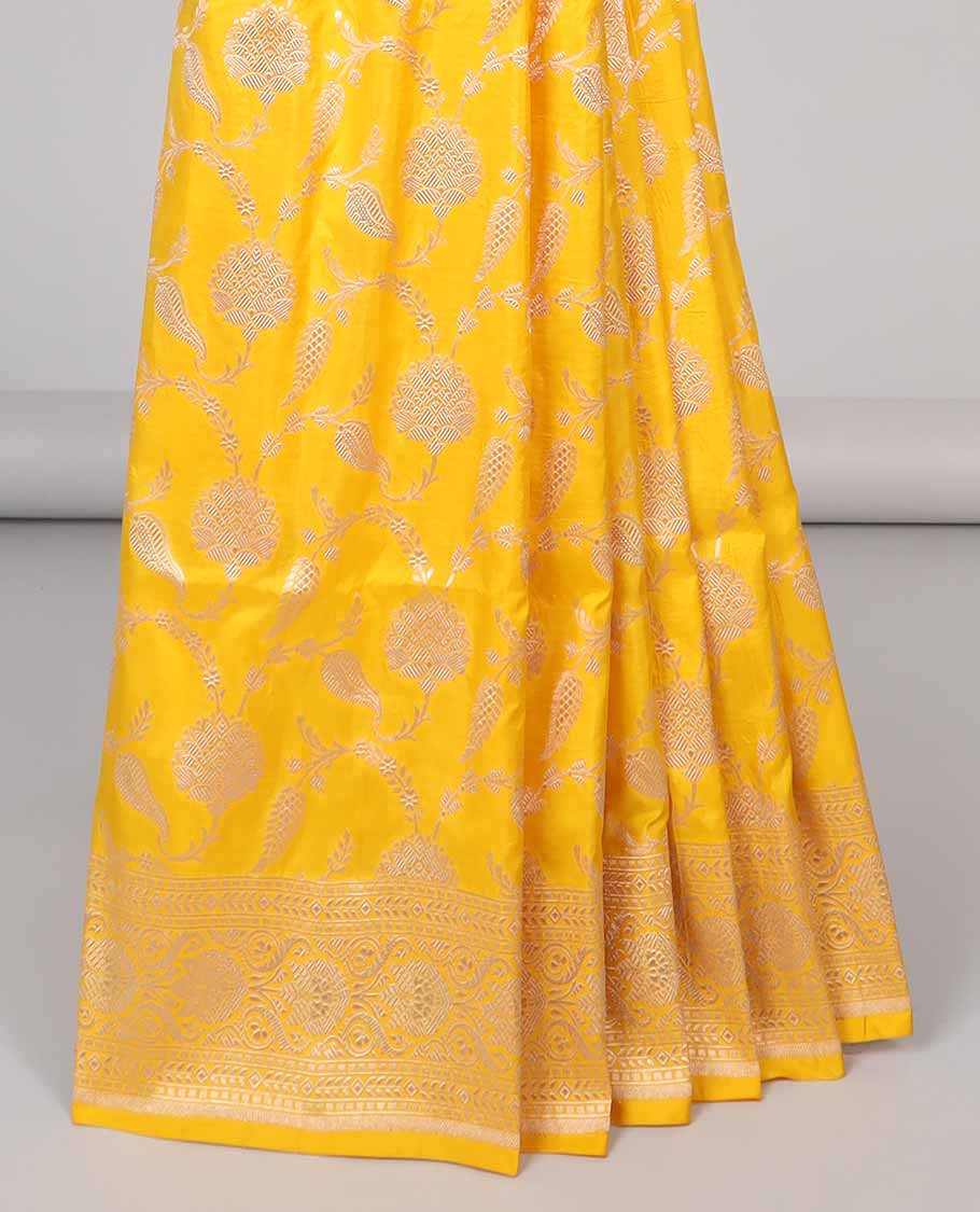 Yellow floral jacquard banaras silk saree with self intricate zari border & floral zari design pallu