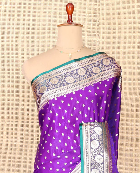 Violet Semi-Banaras Saree, Detailed with Buttas on Its Body, Complemented by a Contrast Floral Creeper Design Border, Intricately Designed Pallu, and Paired with a Contrast Blouse