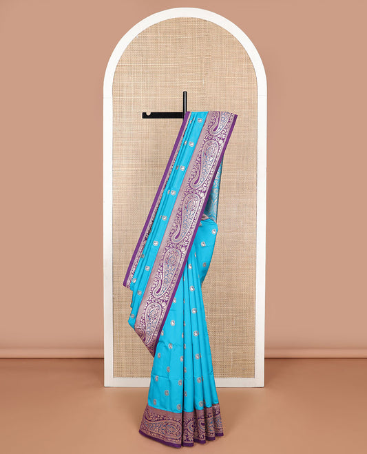 Blue paisley design butter silk saree with contrast paisley zari design border & floral design pallu