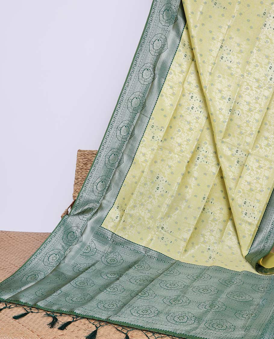 Green floral butter silk saree with contrast floral design border & pallu of floral jaal design