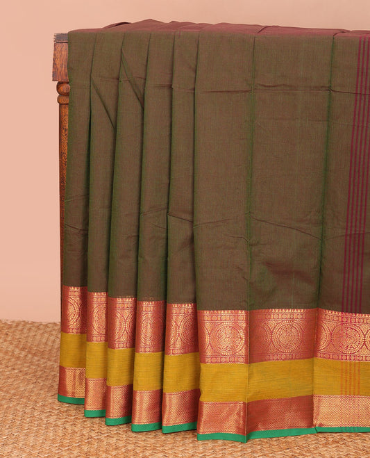 Green plain Chettinad cotton saree, contrast rettai pettu traditional zari border, and pallu of stripes