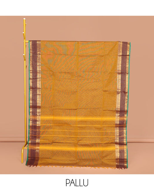Mustard Plain Chettinad Cotton Saree, Complemented by Contrast Traditional Zari Border, Pallu of Stripes, and Paired with a Matching Blouse