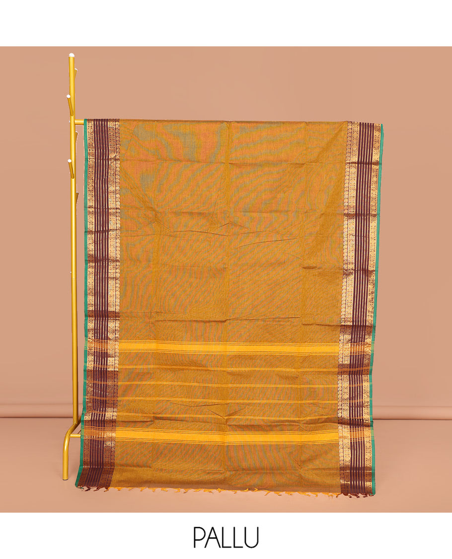 Mustard Plain Chettinad Cotton Saree, Complemented by Contrast Traditional Zari Border, Pallu of Stripes, and Paired with a Matching Blouse