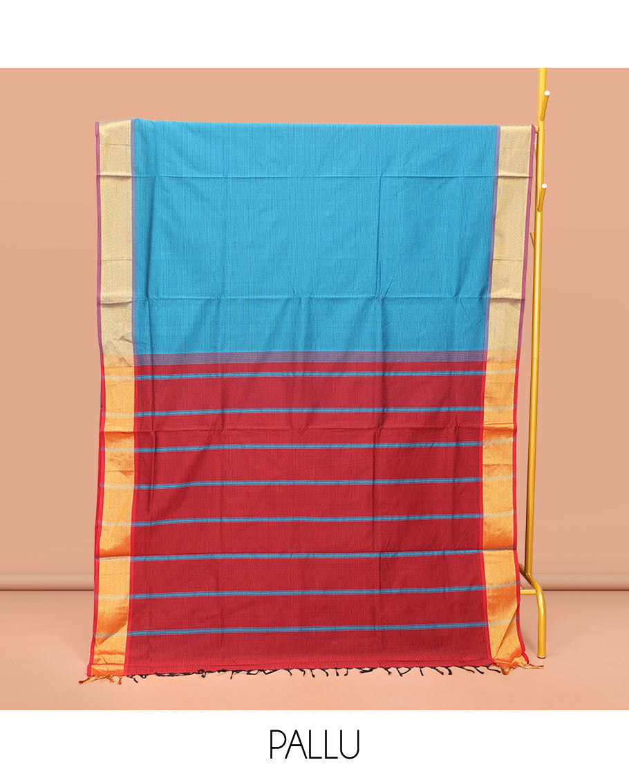 Blue Poly Cotton Saree, Sparsely Threaded with Stripes on Its Body, Complemented by Contrast Peacock-Eyed Border, Striped Pallu, and Paired with a Contrast Blouse