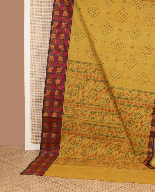 Yellow bandhani printed Chettinad cotton saree, contrast annam chakram enclosed checked border & bandhani printed pallu