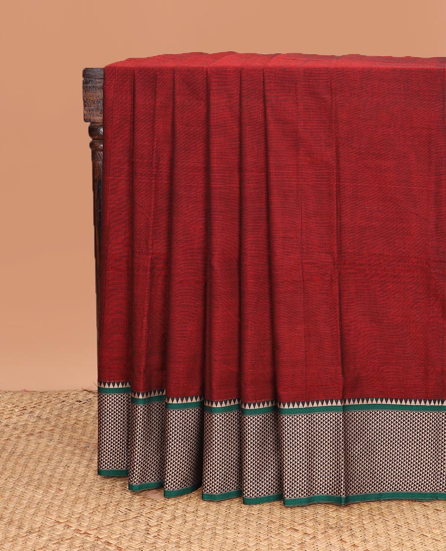 Maroon plain Narayanapet cotton saree, contrast temple ara maadam border, and striped pallu