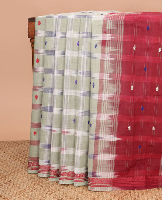 Pale green buttas and checked Andhra cotton saree, paisley border, and contrast pallu of stripes and buttas