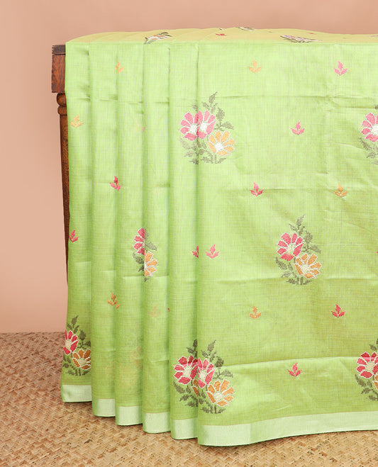 Green floral embroidered chirala cotton saree, plain border, and contrast warli printed pallu