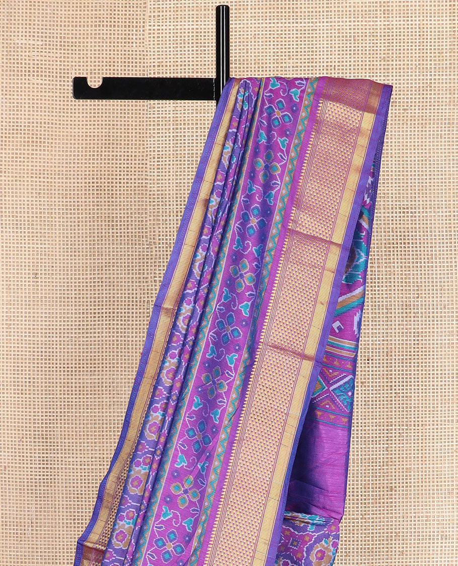Violet ikkat design semi-banaras patola silk saree, traditional zari design border, and ikkat design pallu