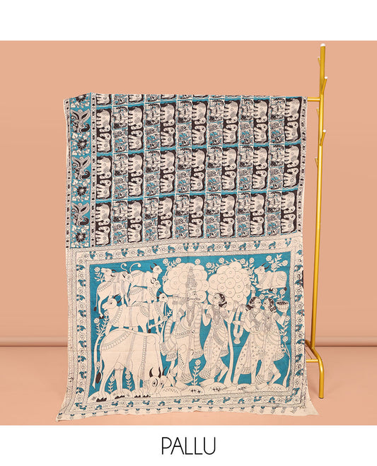 Black Machine-Printed Kalamkari Cotton Saree, Adorned with Elephant and Human Figurine Enclosed Checks on Its Body, Complemented by a Contrast Peacock Printed Border, Pallu of Radha Krishnan Motifs Print, and Paired with a Printed Blouse