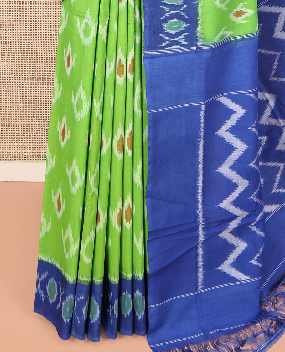 Green Ikkat Cotton Saree, Decked Up with Ikkat Buttas All Over Its Body, Complemented by Contrast Ikkat-Textured Border, Ikkat-Textured Chevron Striped Pallu, and Has No Blouse