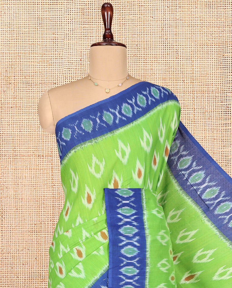Green Ikkat Cotton Saree, Decked Up with Ikkat Buttas All Over Its Body, Complemented by Contrast Ikkat-Textured Border, Ikkat-Textured Chevron Striped Pallu, and Has No Blouse