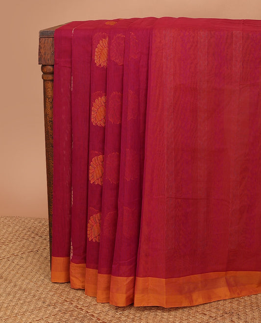 Red buttas kanchi cotton saree, contrast plain border & pallu steeped with leaf motifs