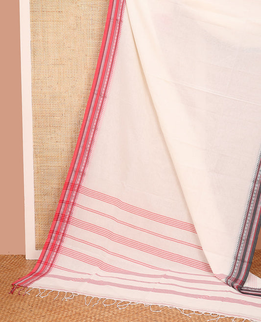 White Plain Khadi Cotton Saree, Complemented by Contrasting Border of Traditional Designs, Subtly Striped Pallu, and Paired with a Matching Blouse