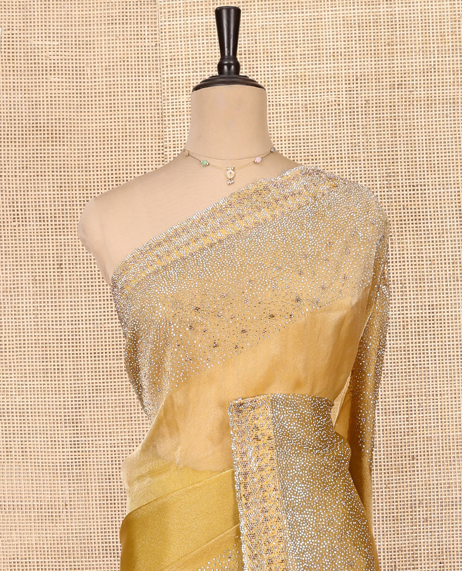 Gold Fendi Silk Saree, Enthralled with Swarovski Stonework Border, and a Stonework Blouse