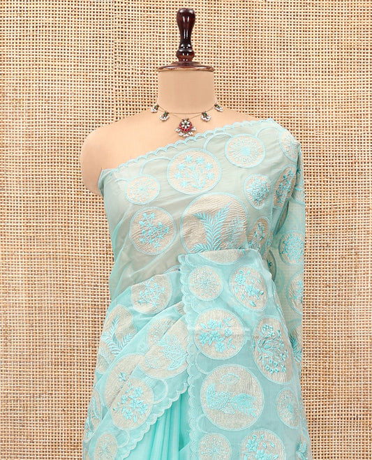 Sea Green Organza Saree, Delicately Woven with Floral Enclosed Circle Motifs Thread Embroidery, Subtle Scallop Border, Delicately Embroidered Pallu, and Paired with a Matching Embroidered Blouse
