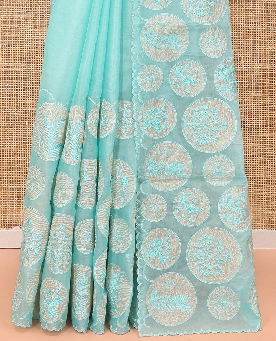 Sea Green Organza Saree, Delicately Woven with Floral Enclosed Circle Motifs Thread Embroidery, Subtle Scallop Border, Delicately Embroidered Pallu, and Paired with a Matching Embroidered Blouse