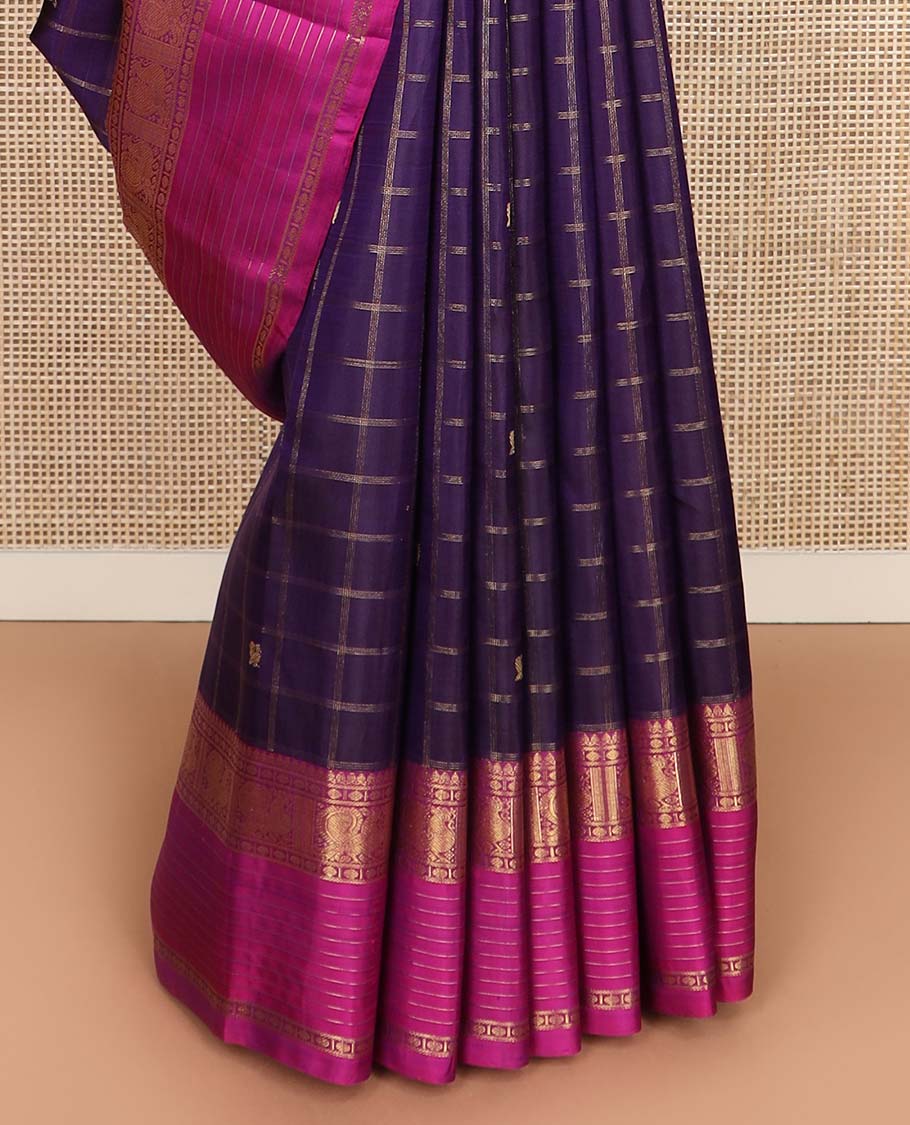Eggplant purple annam chakram buttas enclosed checked Kanchipuram silksaree, contrast border of thilakm mokku, laddu kamalam, and mayil designs, and intricate pallu