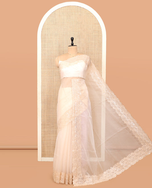 Light Sandal Plain Organza Saree, a Scallop Floral Sequins Embroidered Border, and a Matching Blouse