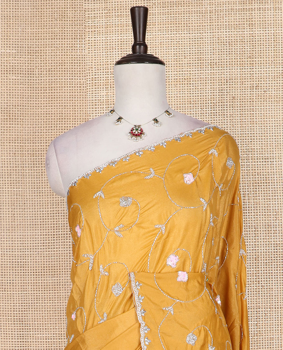 Yellow floral vine kardana embroidered designer saree, stone work border, and floral vine kardana embroidered pallu