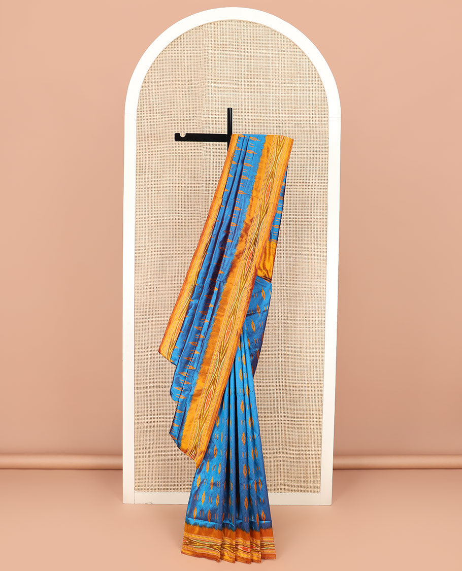 Blue Ikkat Silk Saree Enlivened with Ikkat Buttas, Featuring a Contrast Ikkat-Textured Border and a Pallu Steeped in Ikkat Textures and Stripes