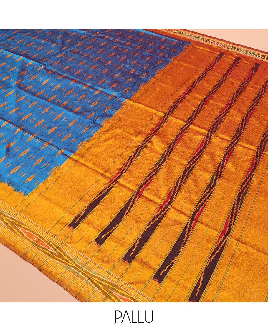 Blue Ikkat Silk Saree Enlivened with Ikkat Buttas, Featuring a Contrast Ikkat-Textured Border and a Pallu Steeped in Ikkat Textures and Stripes