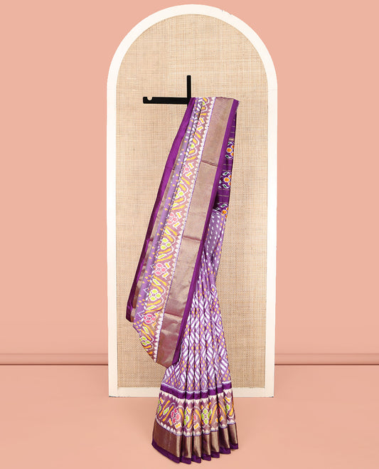 Lavender Ikkat Silk Saree, Embellished with Ikkat Buttas All Over Its Body, Highlighted by a Self-Border of Ikkat and Zari Designs, Pallu of Floral Meena Designs, and Paired with a Matching Blouse