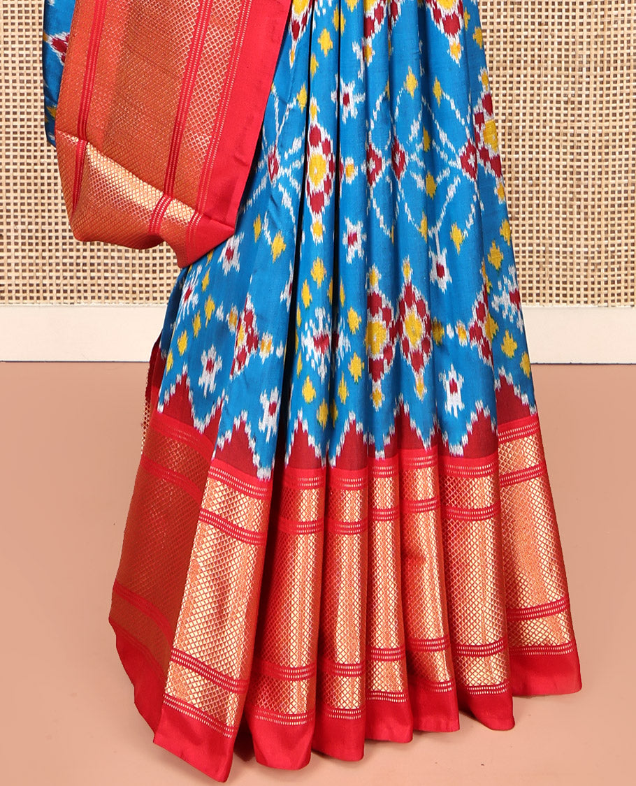 Blue Pochampally Ikat Silk Saree, Adorned with Ikat Patterns on Its Body, Complemented by a Contrast Temple Traditional Woven Border, Pallu of Jaal Ikkat Weave, and Paired with a Contrast Blouse