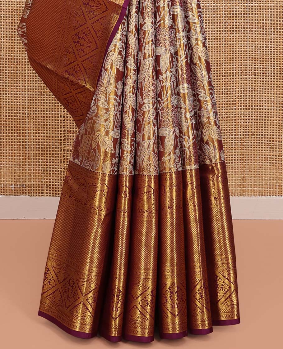 Gold Kanchipuram Tissue Silk Saree, Spotlighted with Jacquard Designs on Its Body, Complemented by a Contrast Border of Thilakam Mokku, Kamalam, Mayil, Mayil Kann, and Diamond Designs, Intricately Designed Pallu, and Paired with a Contrast Blouse