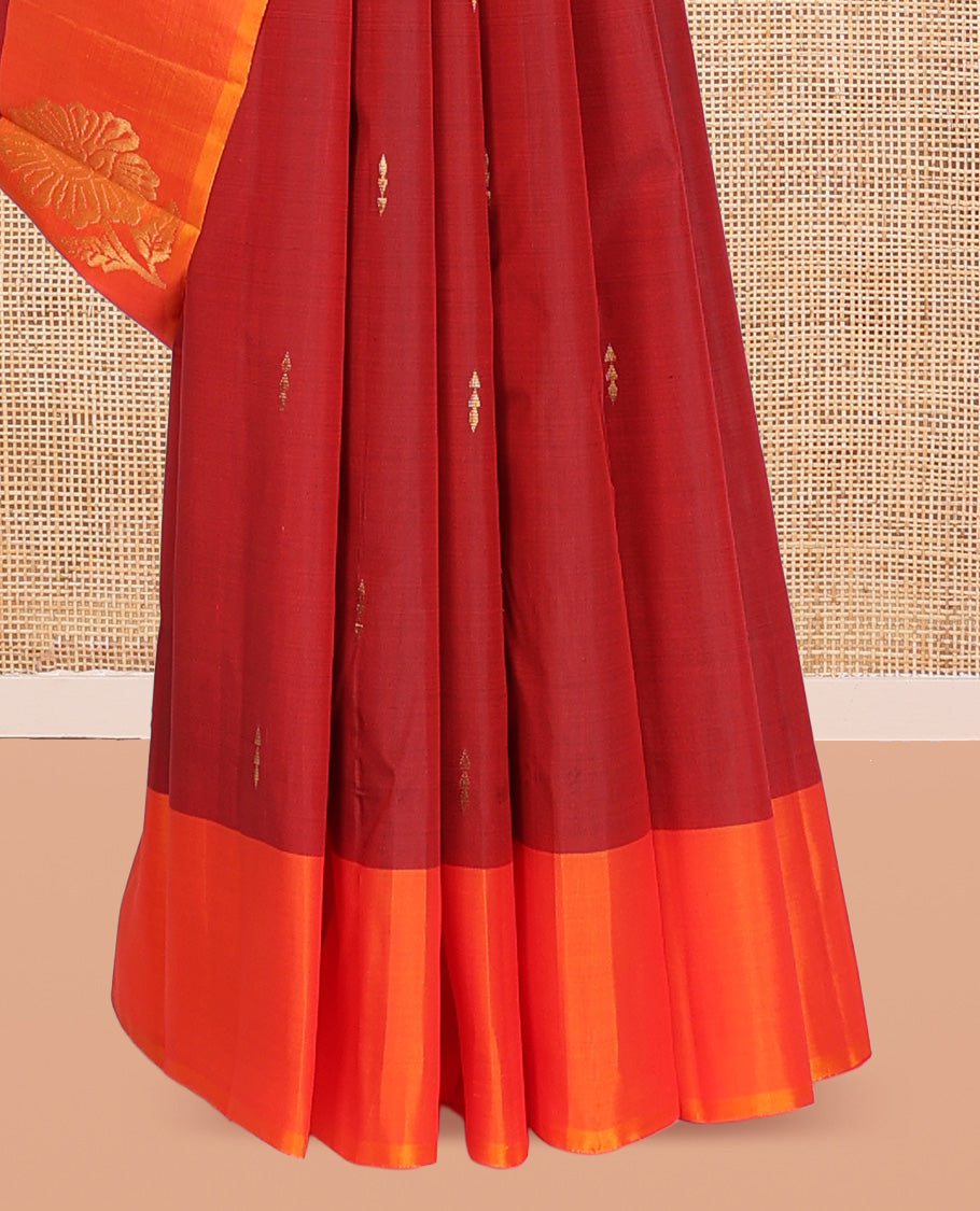 Maroon Kanchipuram Silk Saree, Highlighted with Zari Buttas, Complemented by a Contrast Floral Butta Border, Zari Design Pallu, and a Contrast Blouse