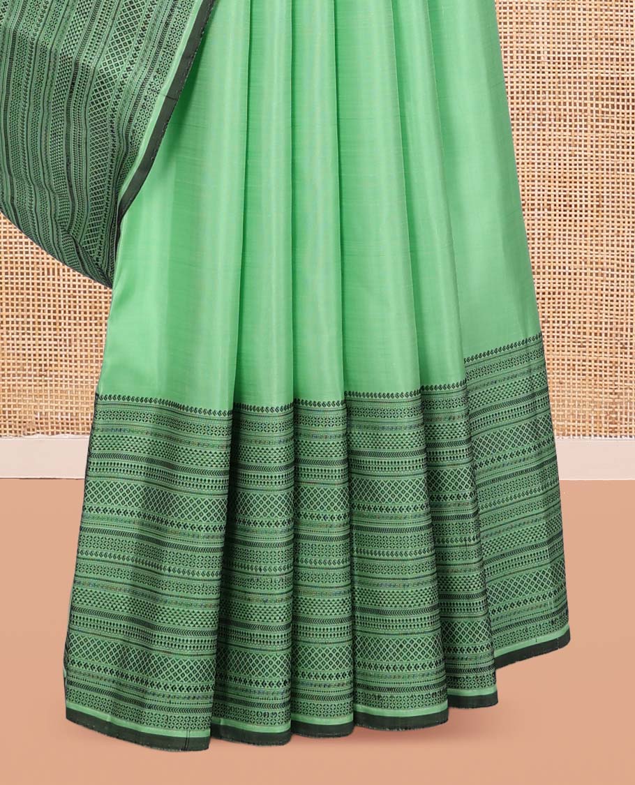 Pista Green Kanchipuram Silk Saree, Woven with Thread Buttas, a Self-Border of Manga, Ara Maadam, Kathir, Mayil Kann, Jaal Pallu, and a Matching Blouse