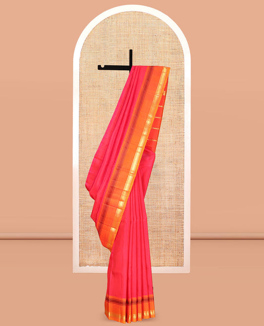 Red Kanchipuram Silk Saree, Complemented by a Contrast One-Sided Rettai Pettu Border of Banaras, and Mayil Kann Designs, Zari Woven Pallu, and a No Blouse