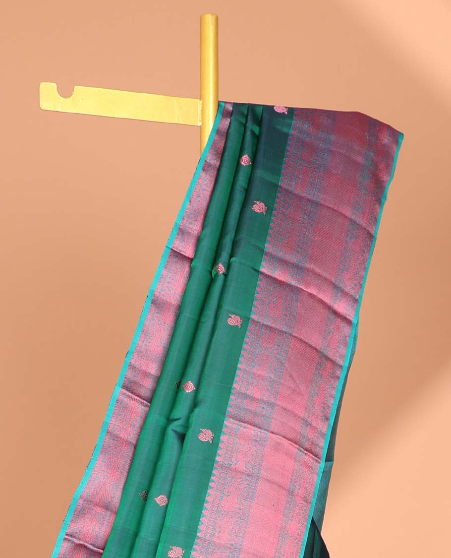 Green floral buttas kancheepuram silk saree with contrast border of thilakam mokku, muthu, paun, banaras design & zari design pallu