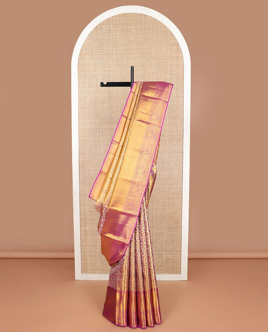 Pink floral jacquard kancheepuram tissue silk saree  with self border of thilakam mokku, muthu, kuyil kann, kodi visiry design & zari design pallu