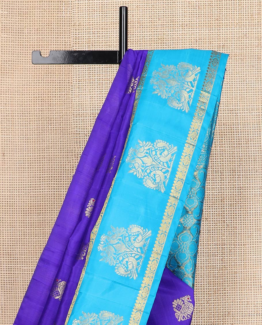 Violet mayil buttas kanchipuram silksaree, contrast one-sided korvai border of thilakam & annam chakram designs & floral design pallu