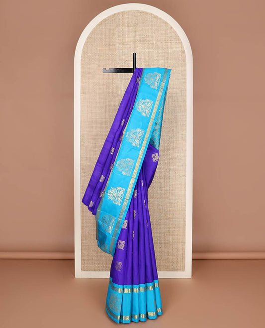 Violet mayil buttas kanchipuram silksaree, contrast one-sided korvai border of thilakam & annam chakram designs & floral design pallu