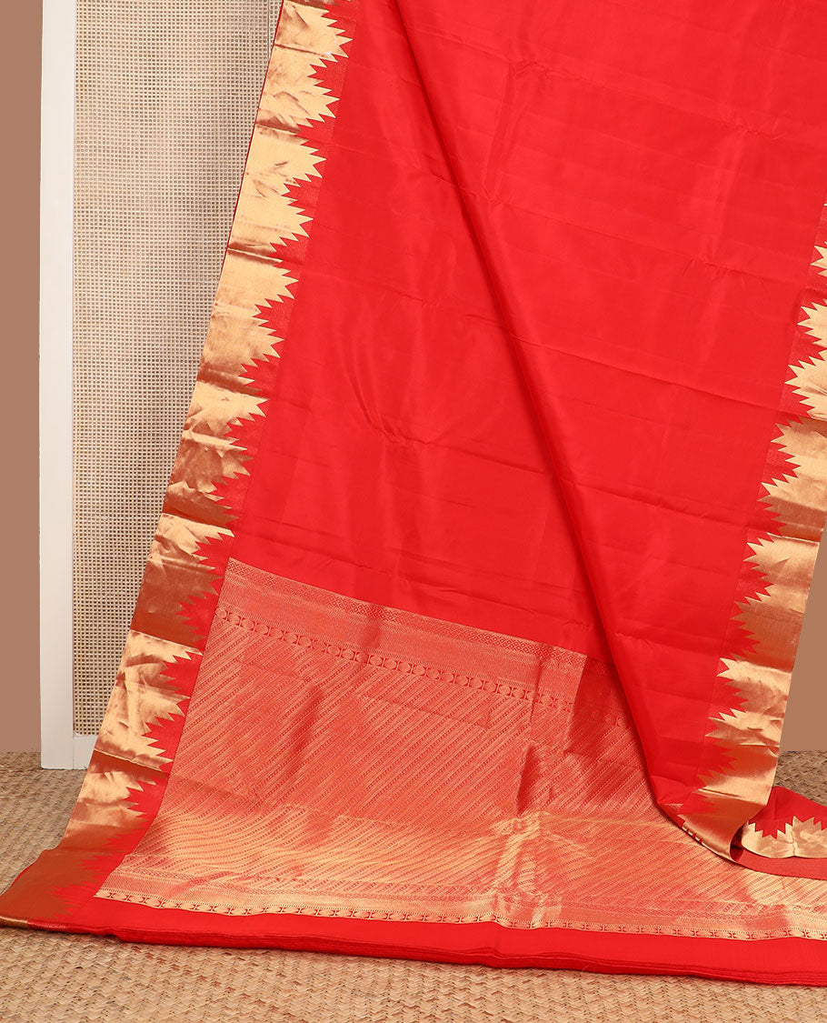 Dazzling red plain Kanchipuram silk saree, Thazampoo rekku golden zari border & pallu steeped with geometric patterns