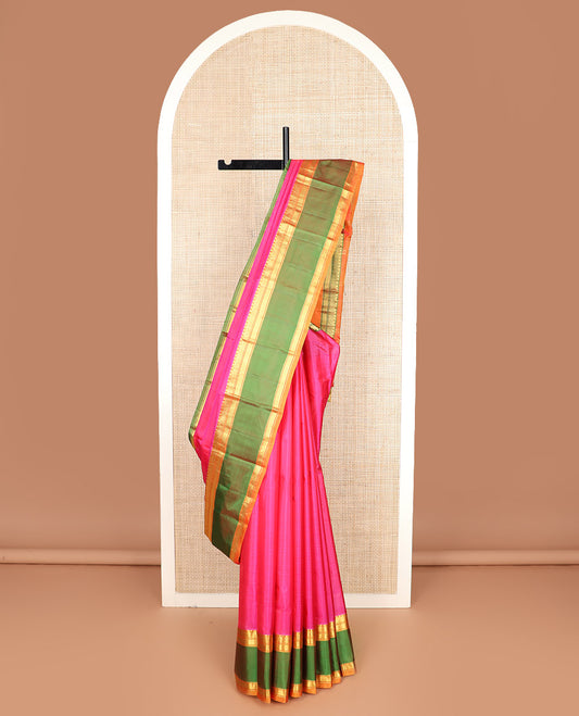 Pink striped Kanchipuram silk saree, contrast ganga jamuna border of diamond, vanki, banaras, and muthu designs, and striped pallu