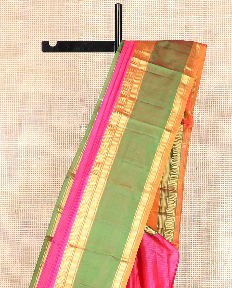 Pink striped Kanchipuram silk saree, contrast ganga jamuna border of diamond, vanki, banaras, and muthu designs, and striped pallu