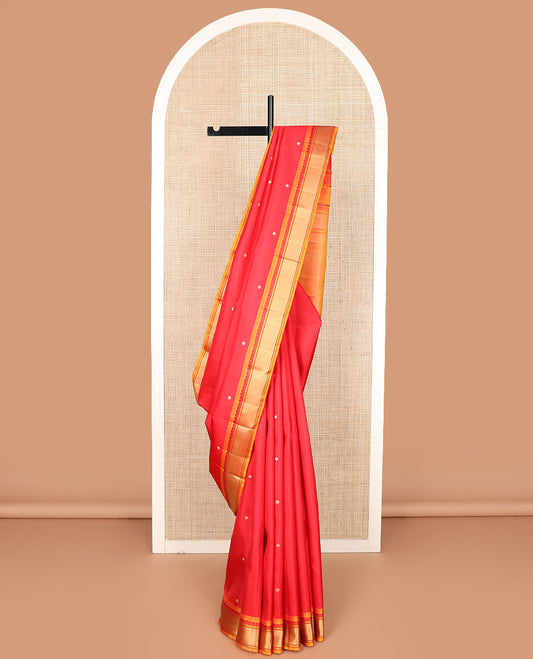 Red rudraksham buttas Kanchipuram silk saree, contrast border of thilakam mokku, neli, and stripes, and jaal pallu