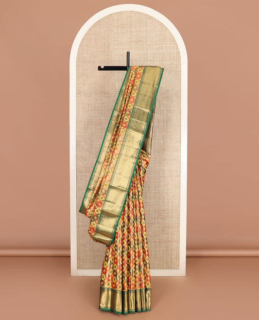 Multi-color ikkat jaal patterned Kanchipuram tissue silk saree, contrast traditional zari border, and pallu of ikkat ogee patterns