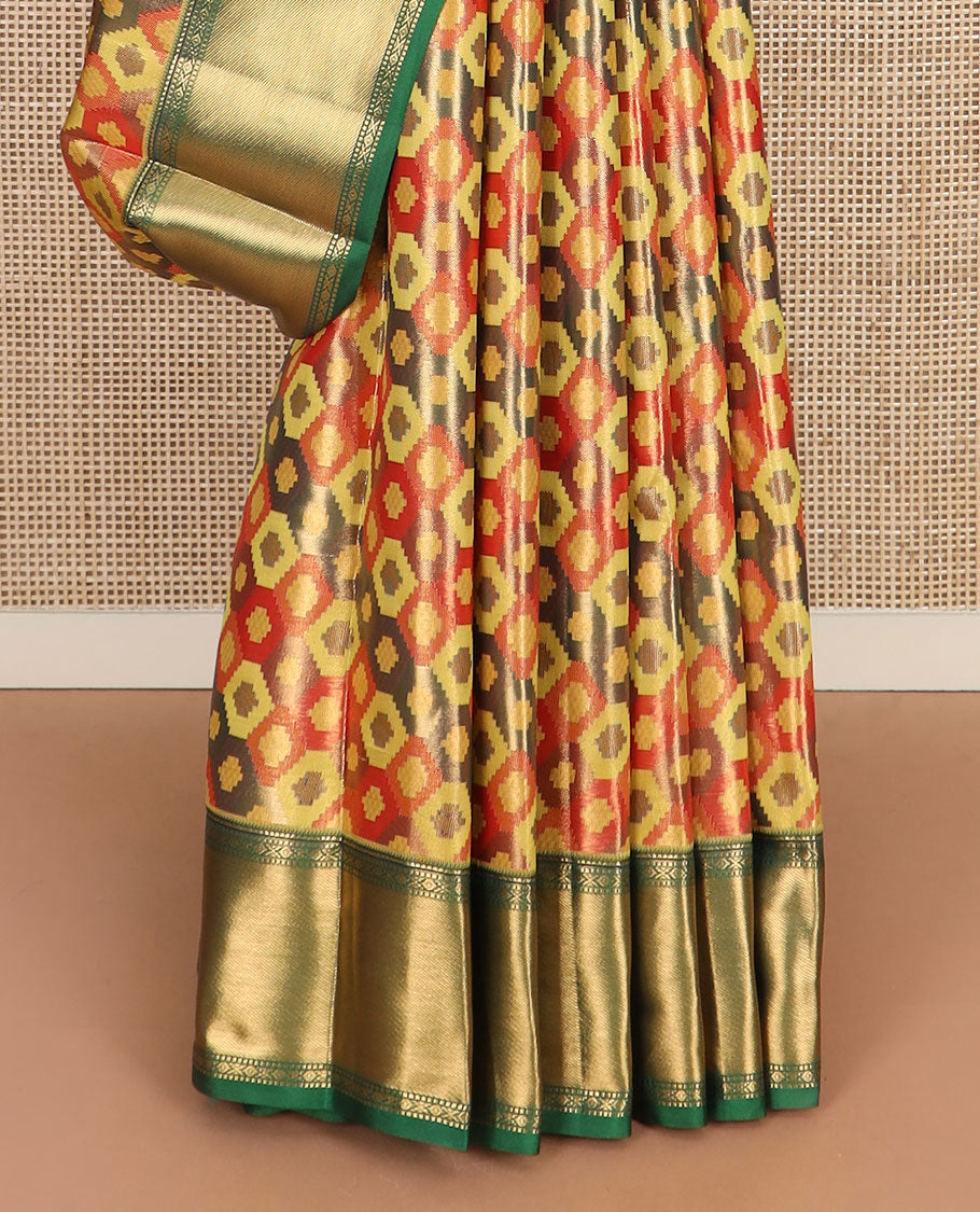 Multi-color ikkat jaal patterned Kanchipuram tissue silk saree, contrast traditional zari border, and pallu of ikkat ogee patterns
