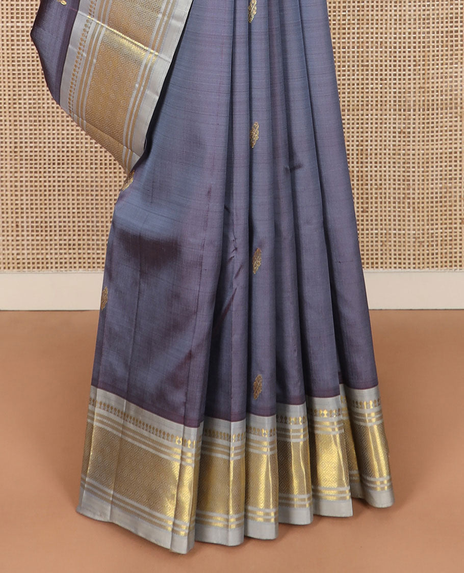 Grey zari buttas Kanchipuram silk saree, zari border of paneer sombu, banaras, and jaal designs, and floral design pallu