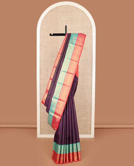 Purple muthu checked Kanchipuram silk saree, contrast korvai border of traditional designs, and jaal pallu